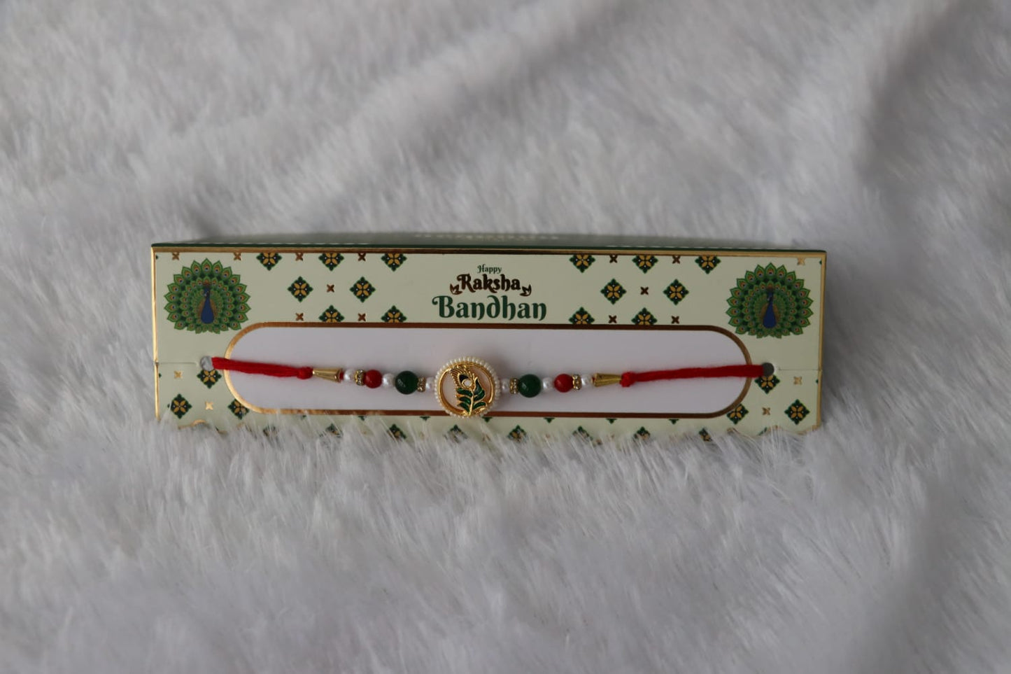 PEACOCK FEATHER DESIGN RAKHI